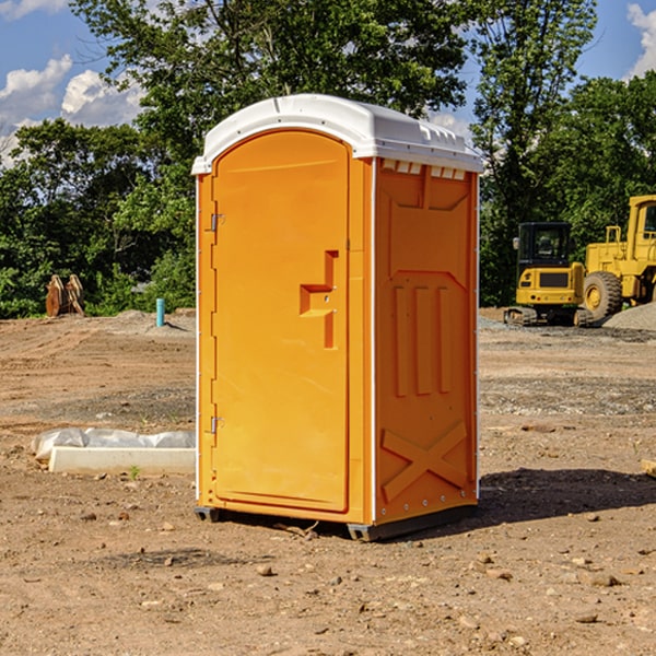 what is the cost difference between standard and deluxe portable toilet rentals in Highland County